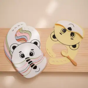 100475-7afd9a.webp Adjustable Silicone Baby Bib with Crumb Catcher and Cute Bear Design