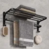 102717-6bb05b.webp Matte Black 50CM Folding Wall-Mount Aluminum Towel Rack with Hook