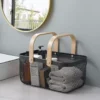 102810-2d9bbc.webp Multi-Purpose Iron Mesh Storage Basket with Wooden Handle