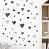 96785-aeafe7.webp Modern Black Heart Wall Decals