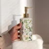 97906-51a2fe.webp Elegant Ceramic Flower Soap Dispenser