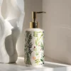 97906-8c6dd8.webp Elegant Ceramic Flower Soap Dispenser