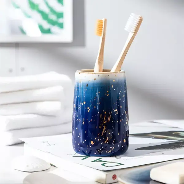 97955-4db78e.webp Elegant Blue Starry Sky Ceramic Bathroom Set