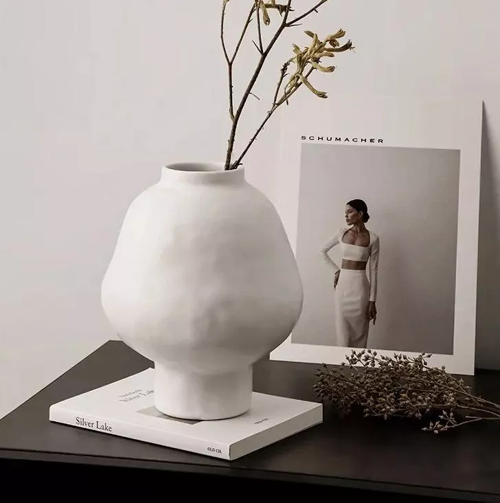 98630-7c7e46.webp Modern Ceramic Hammer Pattern Vase