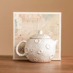 98669-68b6b9.webp Gilded Silver Ceramic Teapot