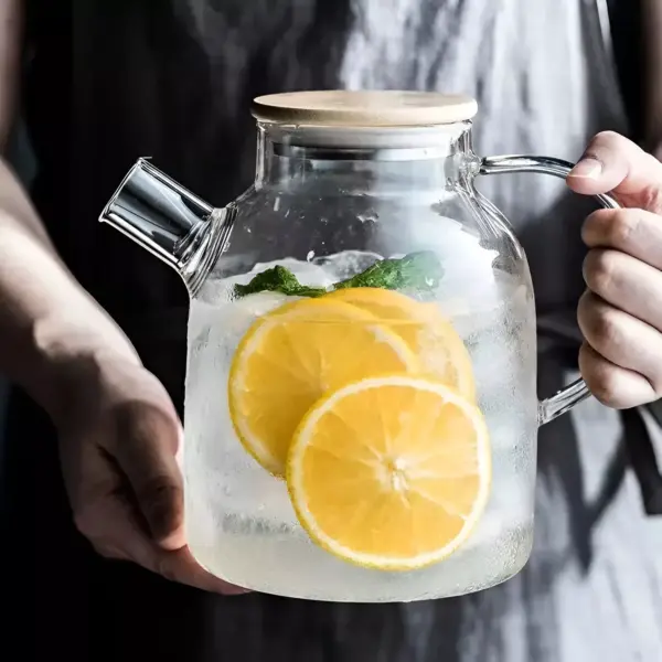 98685-ee4c1b.webp Transparent Glass Teapot with Wooden Lid
