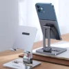 99665-b2f84f.webp Metal Desk Mobile Phone Holder Stand for iPhone