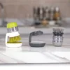106684-912792.webp Eco-Friendly Kitchen Scrub Brush with Soap Dispenser and Holder