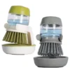 106684-a81cc3.webp Eco-Friendly Kitchen Scrub Brush with Soap Dispenser and Holder