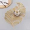 106794-40e0b6.webp Elegant Nordic Leaf Design PVC Placemat - Water Resistant, Non-slip Kitchen Table Mat