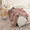 107053-fde501.webp Bohemian Geometric Knitted Blanket
