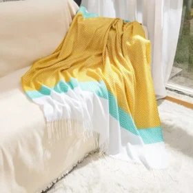 107122-61fdbc.webp Boho-Chic Striped Knitted Blanket with Tassels for Sofa and Bed Decor