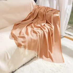 107122-e0a4ae.webp Boho-Chic Striped Knitted Blanket with Tassels for Sofa and Bed Decor