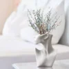 107504-e18125.webp European Ceramic Face Vase