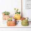 107505-d7d5ac.webp Charming Cartoon Animal Resin Plant Pot