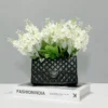107507-39b112.webp Chic Ceramic Handbag Vase