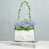 107507-f8197a.webp Chic Ceramic Handbag Vase