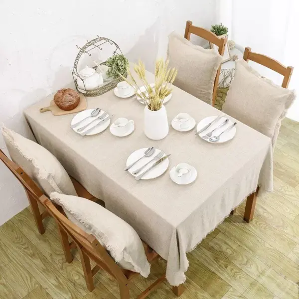 112105-6b7f9b.webp Boho Chic Cotton-Linen Tablecloth with Tassels