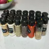112708-b324bf.webp Eco-Friendly 100ML Spice & Condiment Shaker Jars - Perfect for Kitchen Organization